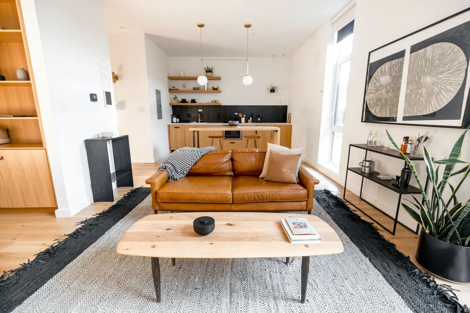 Bright, tidy living room kept fresh with recurring cleaning service